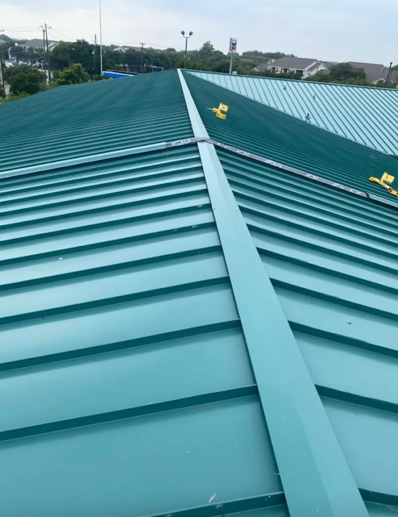 Green commercial metal roof ridge and valley for Metal Roof Repair in Stuttgart